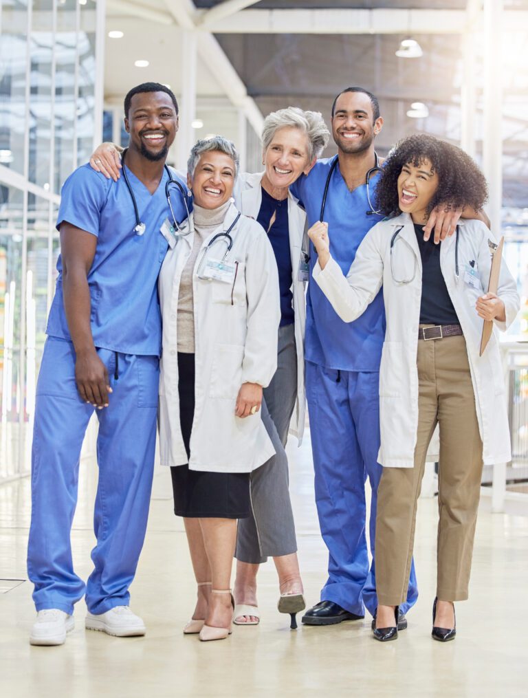 Group portrait of diverse doctors and nurses in healthcare, showcasing teamwork, leadership, and professional mentorship for clinic success.