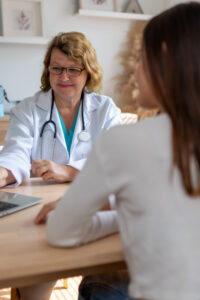 Psychologists engaged in discussion about counseling and treatment strategies for depression.