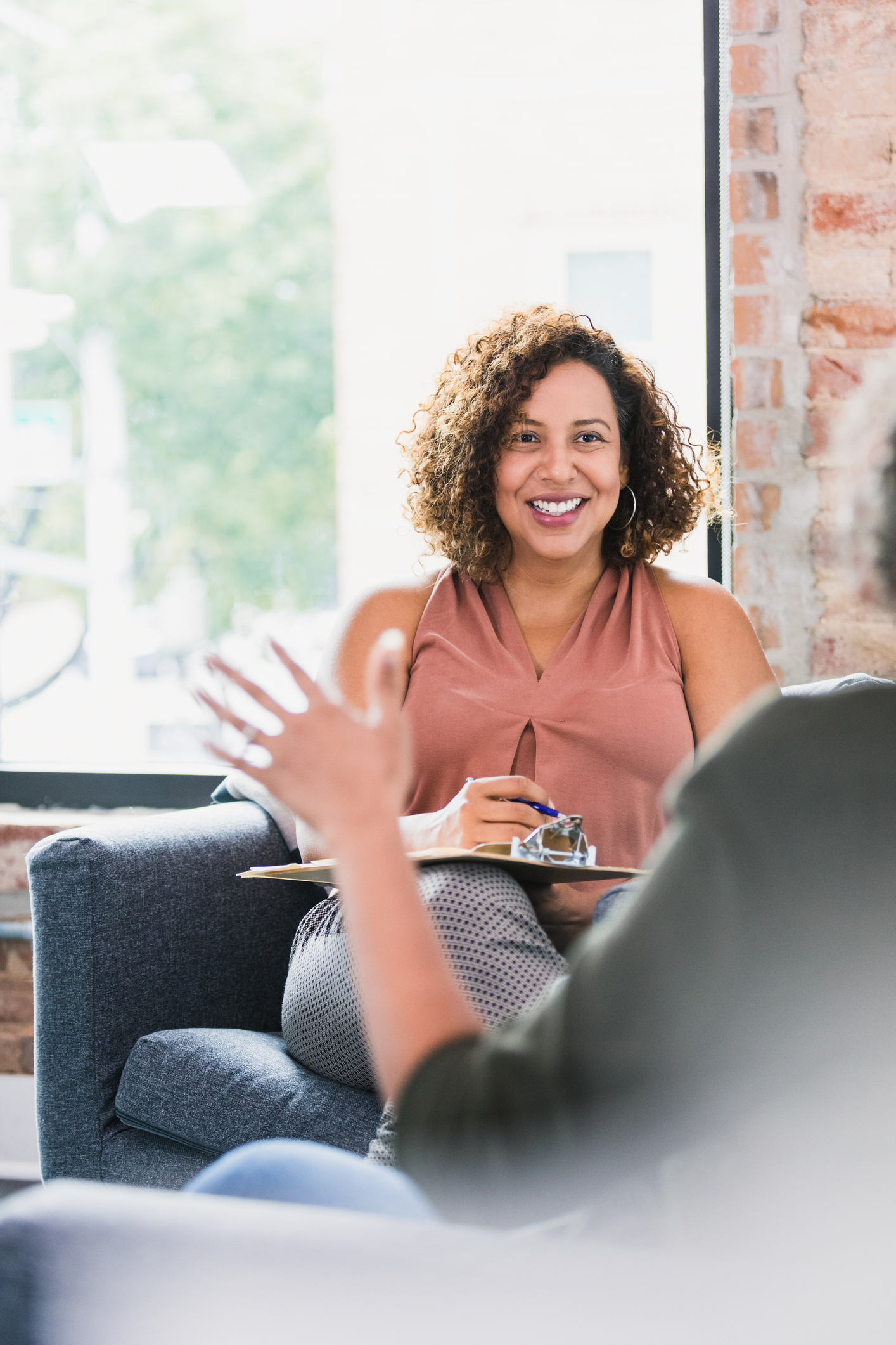 Attentive therapist listening to a client during a counseling session